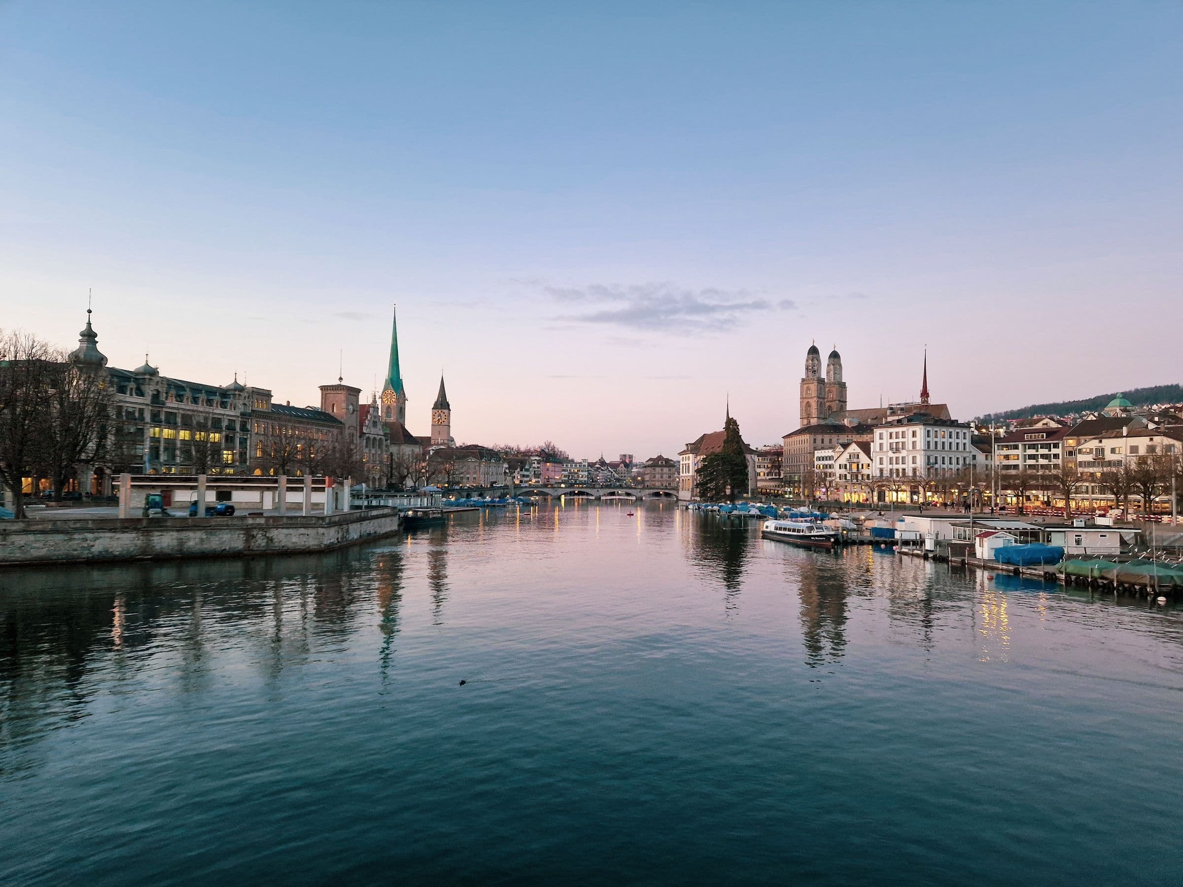 The Limmat river and old town at dusk.