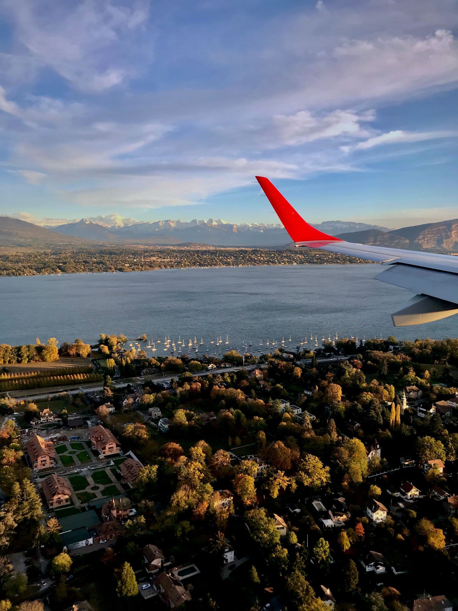 Descending over Lake Geneva and the Alps.