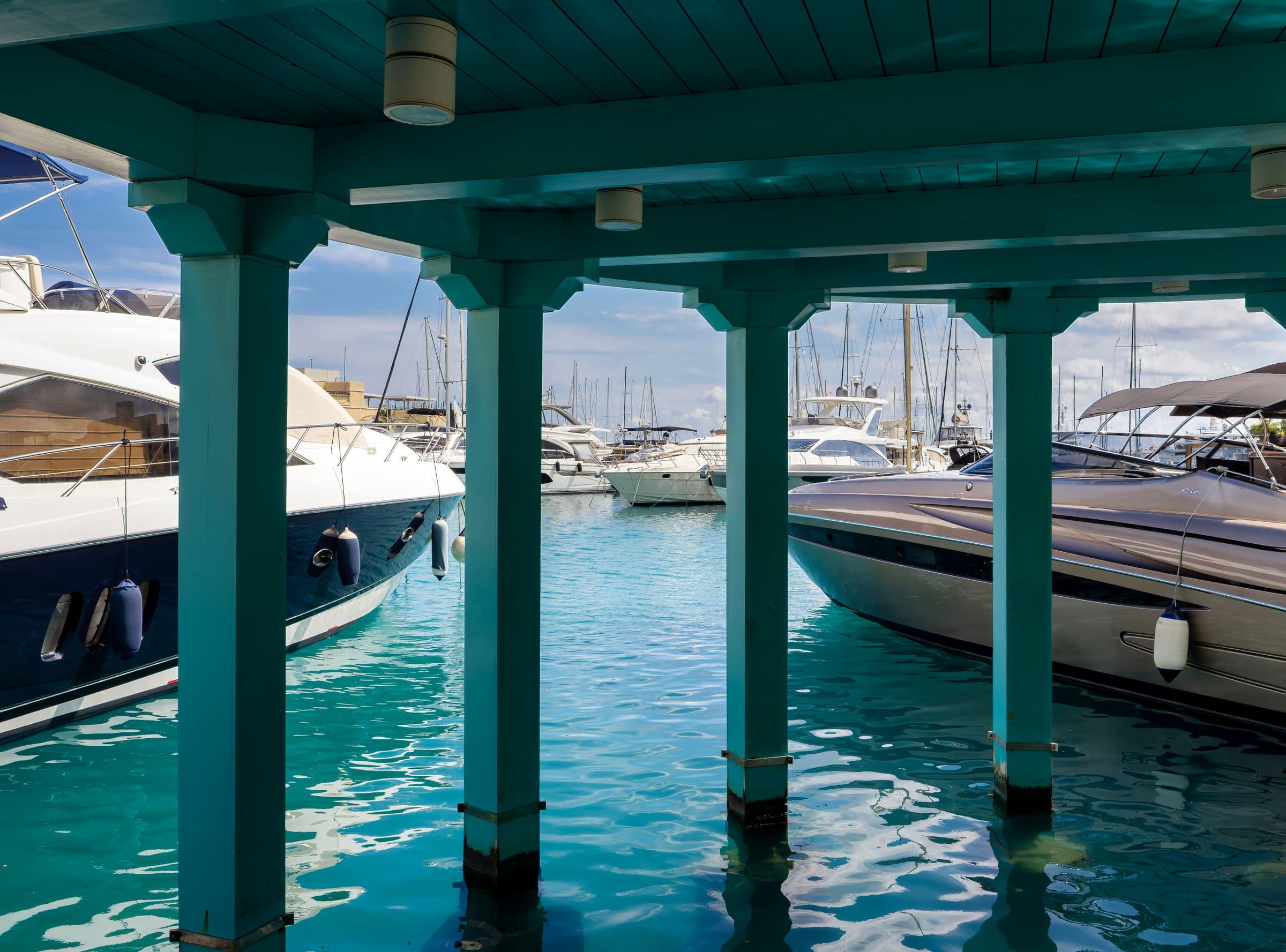 Luxury yachts moored at the marina.